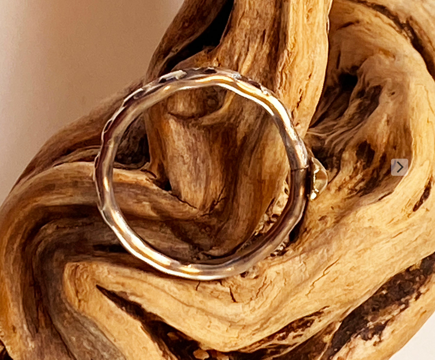 One-of-a-kind hand-crafted stacker ring.  Unique Sterling Silver band is adorned with random star stamp patterns 14k gold star embellishment Beautiful alone or with other rings Ring size 7-1/4 Style: rustic, boho, funky, organic, earthy yet elegant