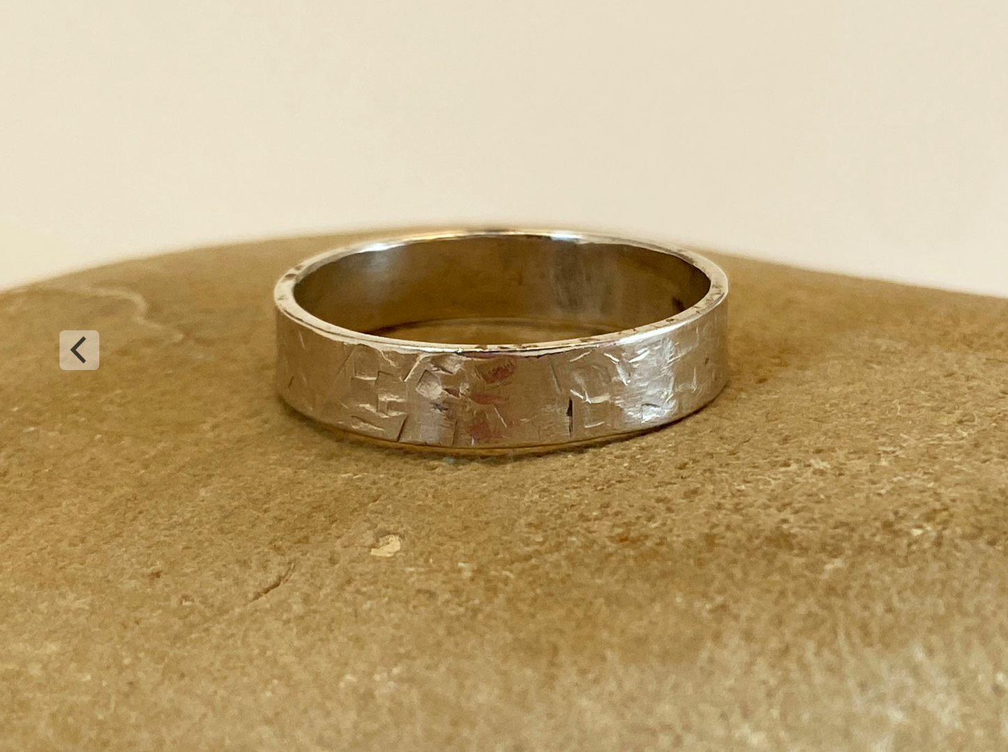 One-of-a-kind hand-crafted ring. Unique Sterling Silver band is adorned with random stamp patterns Ring size 11-1/2 Style: rustic, boho, funky, organic, earthy yet elegant