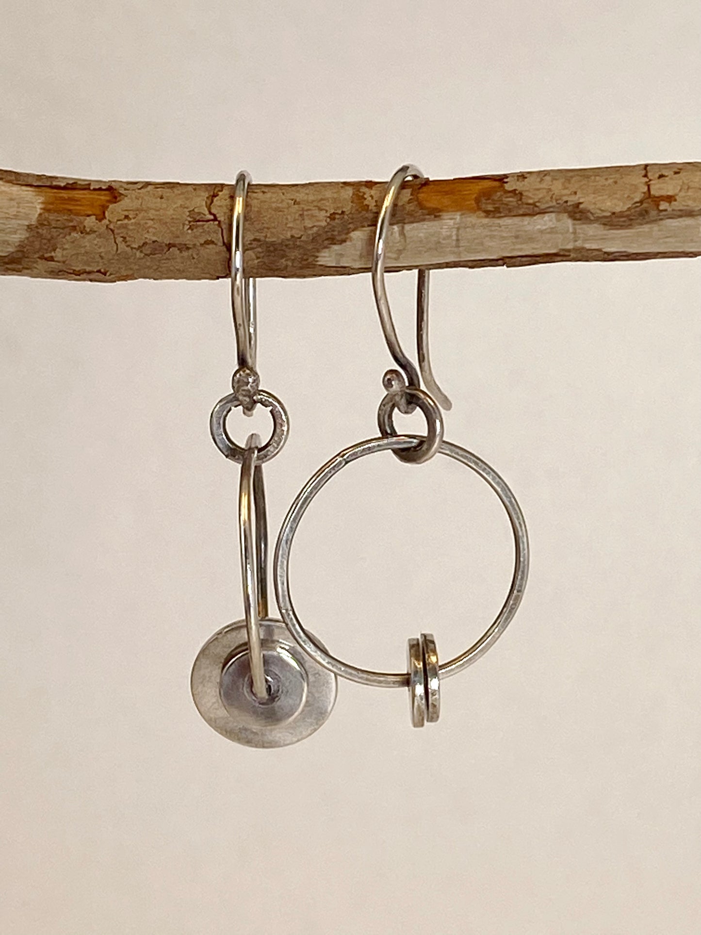 One-of-a-kind hand-crafted hoop earrings with sterling disks and handmade ear wire. Style: rustic, boho, elemental, earthy yet elegant