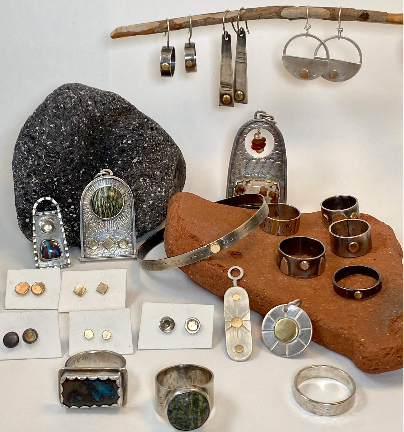 jewelry collection - silver and gold, gold discs with stones, boulder opals; earrings, ring, pendant, necklace, studs, bracelet