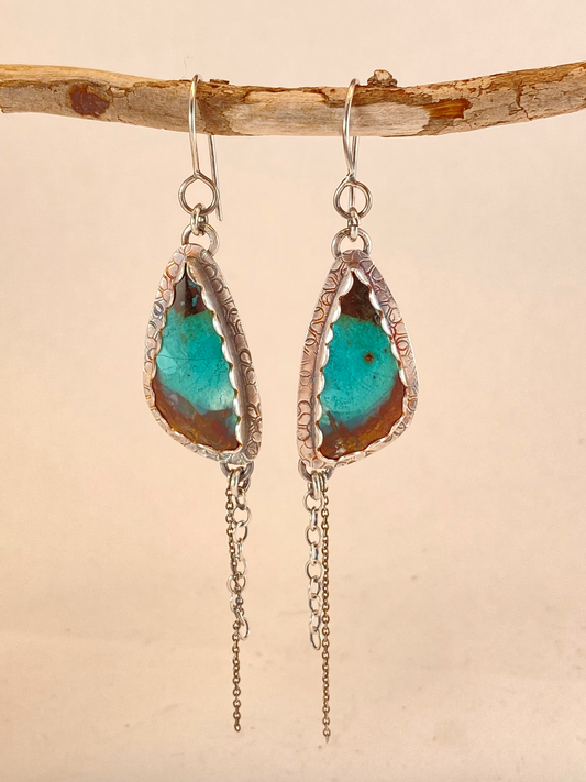 One-of-a-kind hand-crafted earrings. Gorgeous blue Indonesian opal/petrified wood Set on sterling silver Hand-stamped back plate Chain drops add elegant length Style: rustic, boho, funky, elemental, wabi sabi, earthy yet elegant