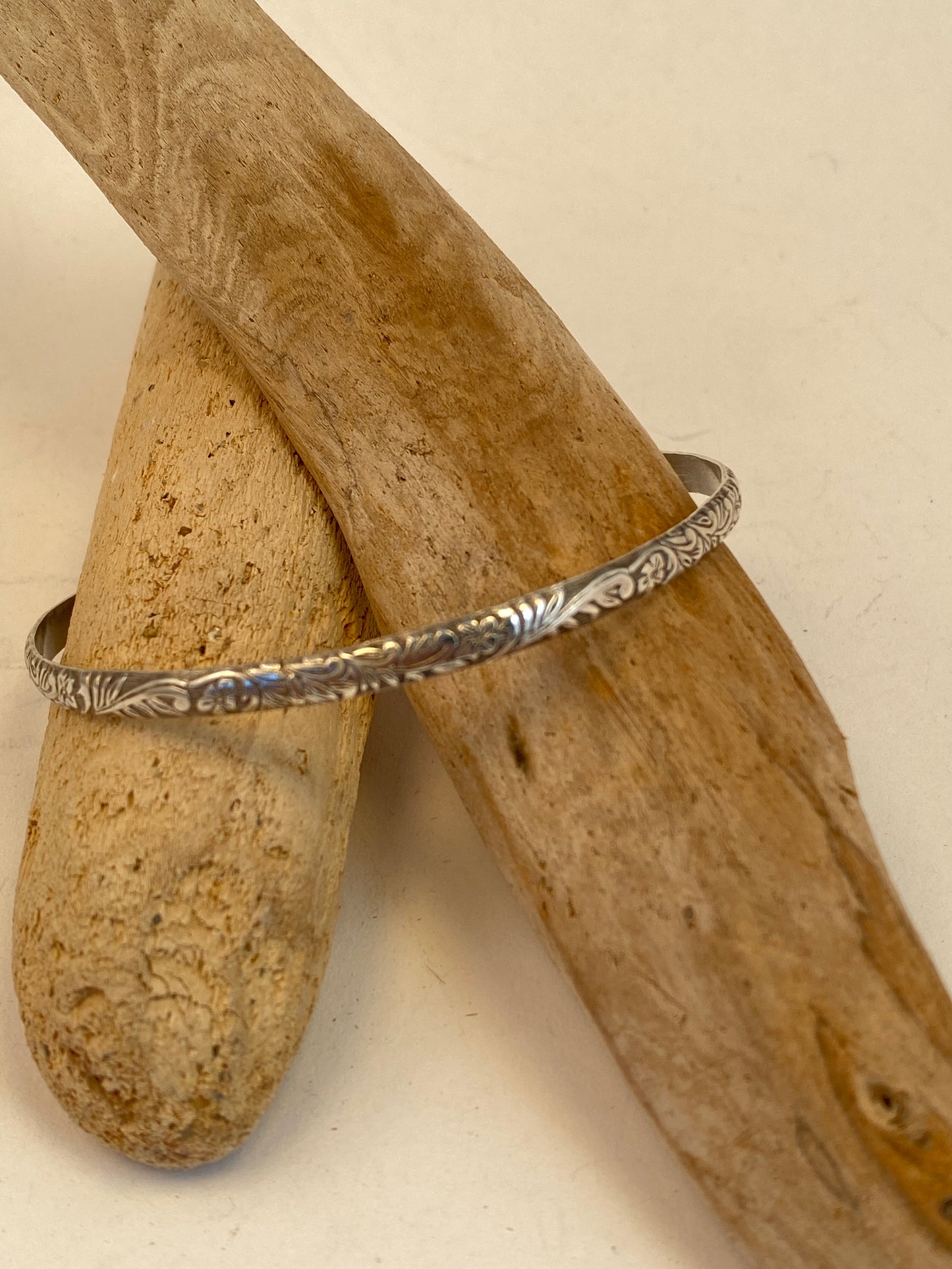 Hand-crafted sterling silver bangle bracelet with beautiful botanical texture.  Style: boho, organic, earthy yet elegant