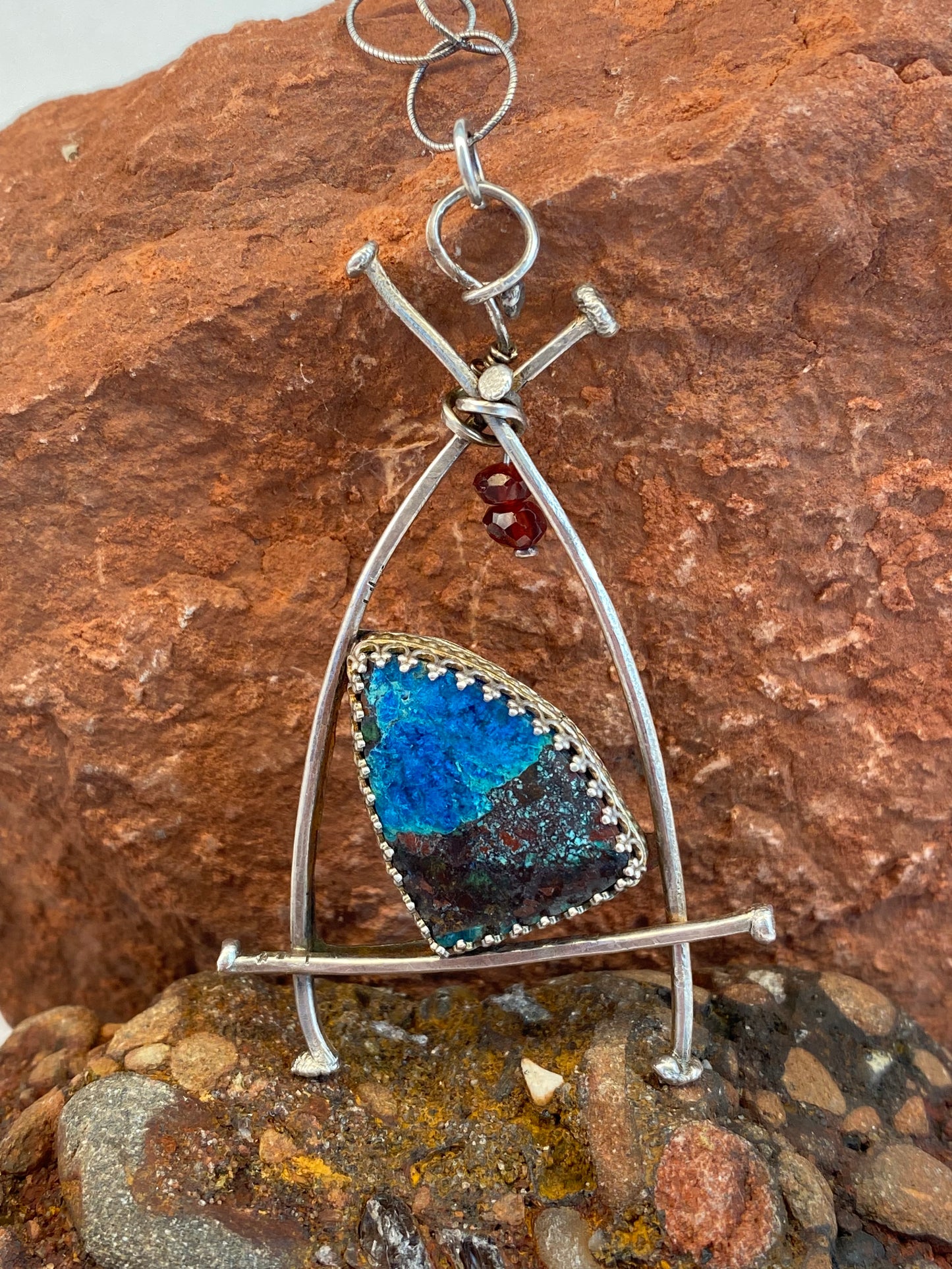 * At the heart of this necklace is beautiful Apache Chrysocolla stone in a fancy bezel surrounded by a sterling silver nail-head frame, reinforced by a sterling backplate. 