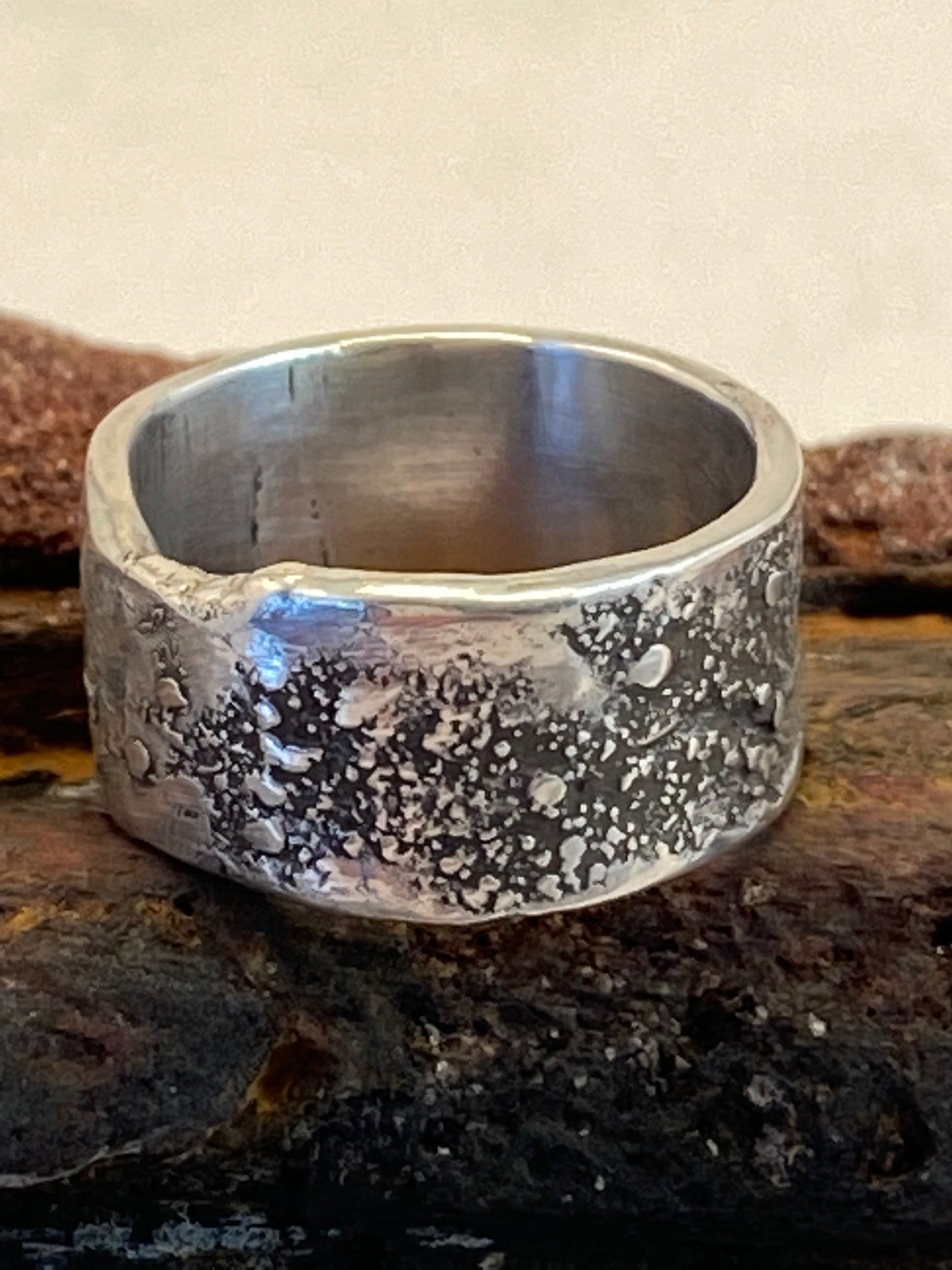 One-of-a-kind hand-crafted sterling silver cigar band ring, beautifully textured with fused silver dust ad with gorgeous organic patina. Ring size 6. Style: rustic, boho, funky, organic, earthy yet elegant.