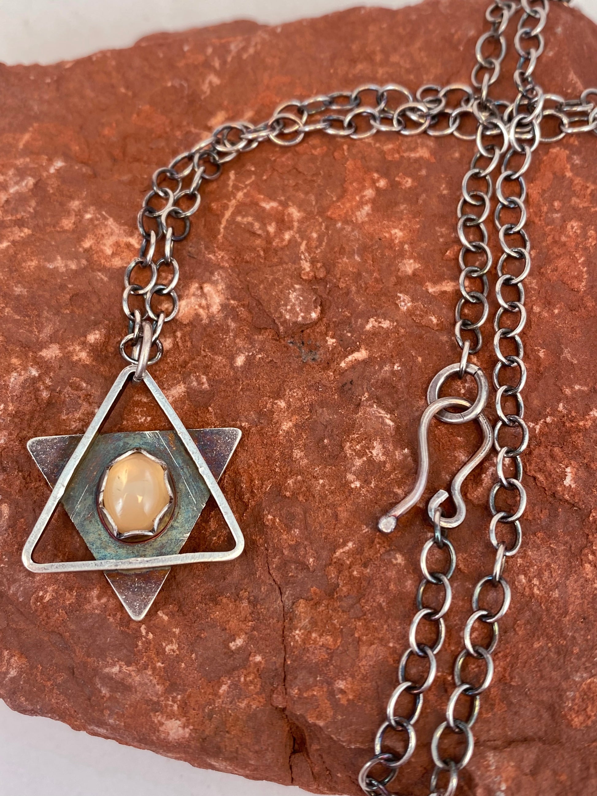 * Handmade Magen David (Star of David) necklace, sterling silver with sunstone.