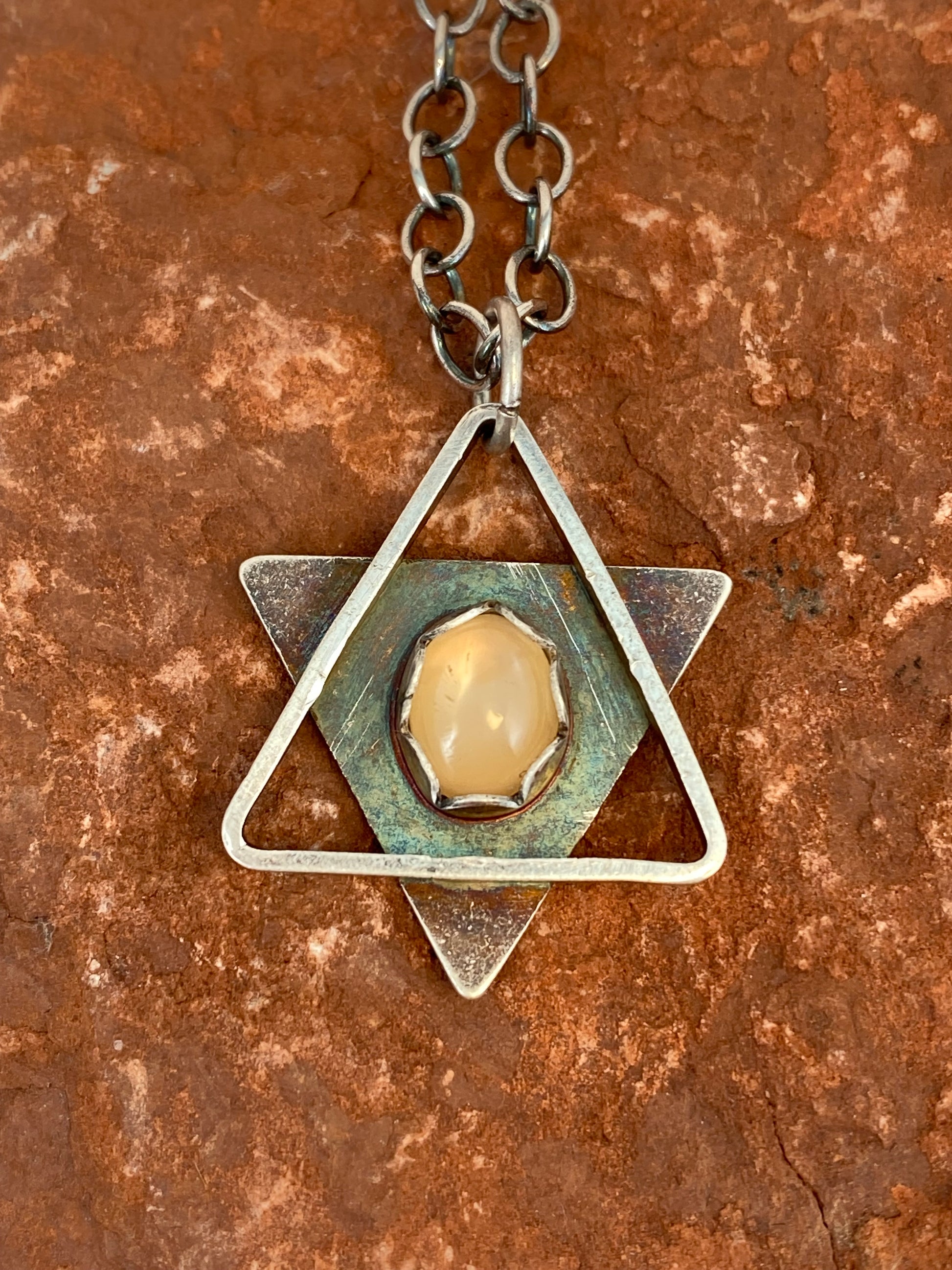 * Handmade Magen David (Star of David) necklace, sterling silver with sunstone.