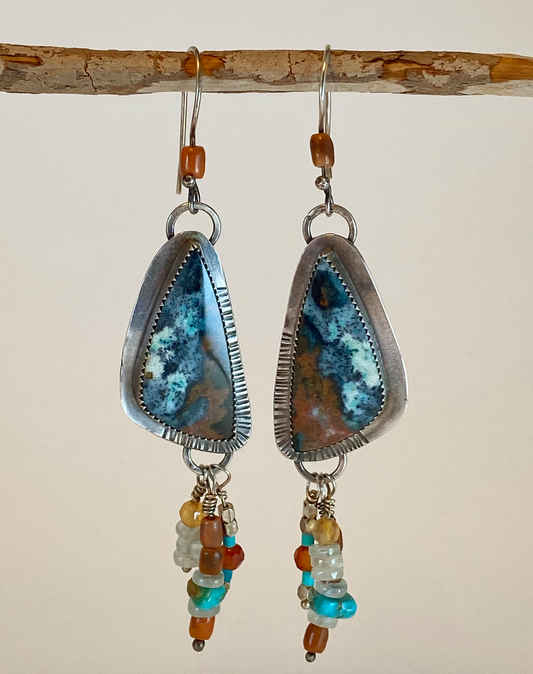 Gorgeous orange and blue Indonesian opal/petrified wood Set on sterling silver Hand-stamped back plate Bead drops include aquamarine, turquoise, carnelian, coral, citrine and silver Style: rustic, boho, funky, elemental, earthy yet elegant